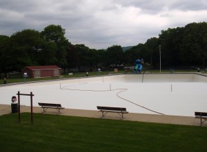 Pool, May 2010. Drained, scrubbed, ready to fill. The cartoon characters are back.